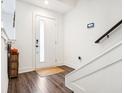 Bright and airy entryway with modern flooring and staircase at 1014 Sterling St, Indianapolis, IN 46201