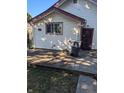 Small backyard patio with access to the back door of the home at 821 N Tuxedo St, Indianapolis, IN 46201