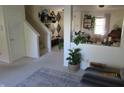 Spacious living room with high ceilings and a half-wall partition at 940 Shenandoah Way, Greenwood, IN 46143