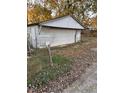 Detached single car garage needing some repairs at 1656 Nelson Ave, Indianapolis, IN 46203