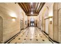 Bright lobby with marble floors and ornate ceilings at 429 N Pennsylvania N St # 804, Indianapolis, IN 46204