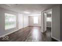 Spacious living room featuring hardwood floors and an open layout at 1519 E Mills Ave, Indianapolis, IN 46227