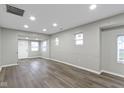 Spacious living room with hardwood floors and lots of natural light at 802 N Tuxedo St, Indianapolis, IN 46201