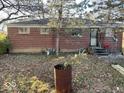 Brick house backyard with a large tree at 4025 N Campbell Ave, Indianapolis, IN 46226