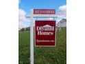 Diyanni Homes real estate sign with contact information at 8030 Totton Ct, Zionsville, IN 46077