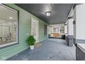 Inviting front porch with a swing and plenty of space to relax at 1542 S Alabama St, Indianapolis, IN 46225