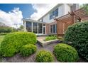 Brick patio with pergola and lush green landscaping at 543 Potomac Ct, Westfield, IN 46074