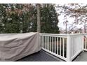 White deck with built-in seating and a covered grill at 2355 W State Road 234, Fortville, IN 46040