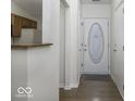 Bright entryway with hardwood floors and access to kitchen at 8520 Bison Woods Ct, Indianapolis, IN 46227
