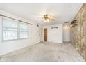 Simple living room with carpet and ceiling fan at 8530 Meadowlark Dr, Indianapolis, IN 46226