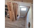 Unfinished interior showing wooden beams, exposed wires, and construction materials at 2845 Forest Manor Ave, Indianapolis, IN 46218