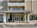 Modern building entrance with covered walkway and stylish design at 3965 N Meridian St # 7E, Indianapolis, IN 46208