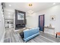 Open living space showcasing a modern fireplace and kitchen view at 1306 S Talbott St, Indianapolis, IN 46225