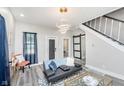 Spacious living room with a comfortable couch and natural light at 1306 S Talbott St, Indianapolis, IN 46225