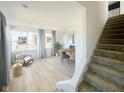 Bright home office space with built-in desk and stairs at 1310 Colere Pl, Indianapolis, IN 46203