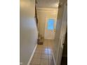 Welcoming foyer with tiled floor, decorative glass front door, and staircase at 636 Creston Point Cir, Indianapolis, IN 46239