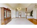 Bright dining room with hardwood floors and a chandelier at 9699 Prairiewood Way, Carmel, IN 46032
