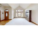 Spacious dining room with hardwood floors and large windows at 9699 Prairiewood Way, Carmel, IN 46032