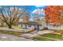 Charming ranch home with a fenced yard and detached garage, nice curb appeal at 8902 Carla Dr, Indianapolis, IN 46219