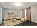 Bright and airy living room featuring a comfy sectional sofa and stylish decor at 8902 Carla Dr, Indianapolis, IN 46219