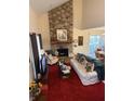Spacious living room with stone fireplace and high ceilings at 3250 Valley Farms Way, Indianapolis, IN 46214