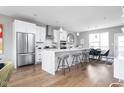Modern kitchen with white cabinets, quartz counters, and stainless steel appliances at 1224 Alabama St, Indianapolis, IN 46202