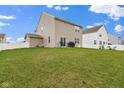 Large backyard with grassy area and privacy fence at 8156 Ebaugh Dr, Camby, IN 46113