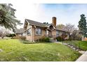Brick house with a well-manicured lawn and walkway at 1330 N Bosart Ave, Indianapolis, IN 46201