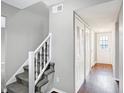 Gray carpeting on stairs with white railing leading to upper level at 1709 Queensbridge Dr, Indianapolis, IN 46219