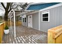 Spacious deck with a covered area, offering a relaxing outdoor space at 11365 W State Road 142, Martinsville, IN 46151