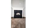 Modern fireplace with a black granite hearth at 3801 Boundary Bay Dr, Indianapolis, IN 46217