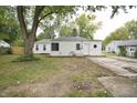 Back of house showing a patio and fenced yard at 4143 N Kitley Ave, Indianapolis, IN 46226