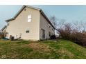 Rear view of house with deck and spacious backyard at 63 Grassyway Ct, Whiteland, IN 46184