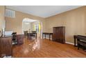 Living room and dining area with hardwood floors at 17849 Grassy Knoll Dr, Westfield, IN 46074