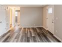 Bright entryway with new flooring and doors at 1822 E 6Th St, Anderson, IN 46012