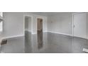 Bright living room with hardwood floors and neutral walls at 446 S Grand Ave, Indianapolis, IN 46219