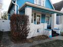 Front entrance with white brick columns and porch at 443 N Centennial St, Indianapolis, IN 46222