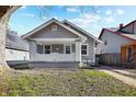 Charming gray craftsman home with a welcoming front porch at 1315 Winfield Ave, Indianapolis, IN 46222