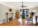 Spacious living room with hardwood floors, fireplace and large windows at 11262 N Everett Rd, Monrovia, IN 46157