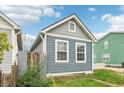 Gray house with white trim and a partially visible side yard at 359 Terrace Ave, Indianapolis, IN 46225