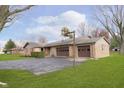 Ranch house with a basketball hoop and spacious yard at 1189 N County Road 475 E, Avon, IN 46123