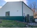 Rear view of metal building with green lower walls at 5800 S State Rd 37, Tipton, IN 46072