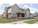 Two story home with gray siding, covered porch, and landscaping at 17366 Newton Main St, Westfield, IN 46074