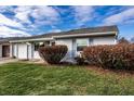 Ranch home with attached garage and neat landscaping at 8016 Minlo Dr, Indianapolis, IN 46227