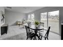 Bright breakfast nook with sliding glass doors leading to backyard at 1126 Lona Dr, Martinsville, IN 46151