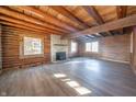 Spacious living room with wood floors and exposed beams at 4298 W 300 N, Anderson, IN 46011