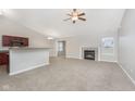 Spacious living room featuring a fireplace and vaulted ceiling at 2368 Black Gold Dr, Indianapolis, IN 46234