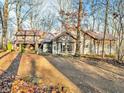 Log home nestled in woods with a large yard and copper roof at 3499 Raspberry Ln, Nineveh, IN 46164