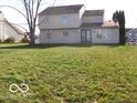 Spacious backyard with large grassy area at 10604 Creekside Woods Dr, Indianapolis, IN 46239