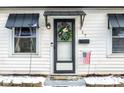 Front door with wreath and American flag at 917 Garfield St, Lebanon, IN 46052